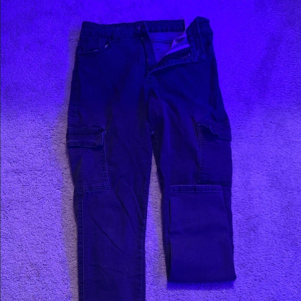 All black jeans, cargo pockets.